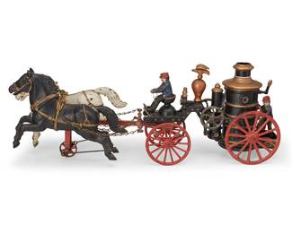 1141
Late 19th/early 20th century
An Ives cast iron horse-drawn fire pumper toy
With Sotheby's New York tag, Sale 7580
The polychrome enameled cast iron toy with driver figure, rear figure, and articulated galloping horses
9.25" H x 24.5" W x 6.75" D
Estimate: $400 - $600