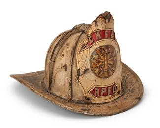 1136
Early/mid-20th century
A Cairns & Brothers fireman helmet
Badge reads: Chief / RPFD
The metal and white leather helmet with front and rear visors, featuring a leather badge and gilt-metal eagle accent, the interior with cotton felt and leather lining
8.5" H x 10.5" W x 14.25" D
Estimate: $400 - $600