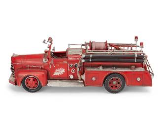 1150
Mid-20th century
A vintage wrought iron fire truck toy
With later hand-drawn markings
The possibly assembled painted wrought iron model of a Chevrolet fire engine with mounted side ladders, hoses, and other accessories, raised on plastic wheels
7" H x 19.25" W x 5.75" D
Estimate: $400 - $600