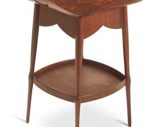 1164
Early 20th century
An Art Nouveau marquetry tray-top tea table
Stenciled to underside: 119 3
The detachable shaped square tray top featuring marquetry inlaid radiating dandelion leaves and flowerhead motifs, with opposed open heart-shaped bronze handles, over a storage area raised on four legs joined by an undershelf
Overall: 32" H x 22" W x 22" D
Estimate: $500 - $800