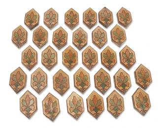 1229
1926-1931
A collection of Malibu Potteries tiles
Eight incised to underside: DN5
The group of matching polychrome glazed ceramic tiles, each depicting a floral motif in blue, green, and orange on an ochre ground, 31 pieces
Each: 6.875" H x 4" W x 1" D
Estimate: $600 - $800