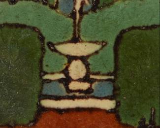 1059
Early 20th century; Boston, MA
A Grueby Pardee glazed pottery tile
Stamped verso: Grueby / [illegible] / Boston / [partial central lotus flower logo]
The polychrome ceramic tile depicting a garden fountain amidst manicured hedges, decorated in cuerda seca matte glazes
Sight: 3.625" H x 3.625" W
Estimate: $500 - $700