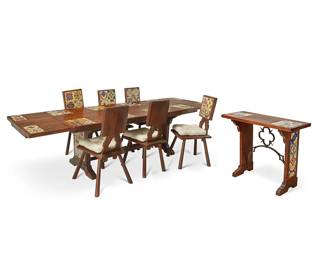 1234
Circa 1920s
A Spanish Revival oak and tile dining set
Each featuring inset vibrantly glazed ceramic tiles, comprising a trestle table (30" H x 84.25" W x 36" D) with two extension leaves (Each: 18" L), six side chairs with associated cotton upholstered seat cushions (Each: 38.25" H x 21.25" W x 21" D), and a small trestle server with quatrefoil wrought iron and arched support/stretcher (34" H x 44.25" W x 16.5" D), 10 pieces
Estimate: $3,000 - $5,000