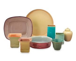 1069
Ernest A. Batchelder (1875-1957)
A group of pottery tableware items, mid-20th century; Pasadena, CA
All but one marked: E A Batchelder; two further marked: Kinneloa Kiln; each variously numbered; the associated marked: Winfield / Pasadena / 230
The duotone glazed ceramic wares, comprising 2 serving trays, 2 squared vases, 2 squared vases with flared rim and incised wavy line accents, 1 lidded ginger jar, and 1 rounded vessel, together with an associated Winfield Pottery serving tray
9 pieces
Widest tray: 1.75" H x 13.5" Dia.; Smallest vessel: 4.125" H x 3.625" W x 3.625" D
Estimate: $300 - $400