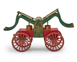 1144
Early 20th century
A Clark Ship Model Co. cast iron fire pump toy
Marked in the casting to each side: Friendship [handshake] 1774
Modeled after 19th century side cylinder manual pumpers, the enameled cast iron toy with articulated levers mounted on four wheels
8.75" H x 14" W x 4.75" D
Estimate: $300 - $500