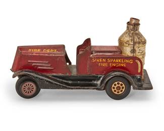 1148
Early 20th century
A Marx "Siren Sparkling" fire engine toy
Marked to each side: Siren Sparkling / Fire Engine / Fire Dept.; marked in the casting to underside: Patented March 15, 1927 / No. 1,621,266
The painted pressed steel toy with friction drive and four plastic tires
5" H x 9.25" W x 4.25" D
Estimate: $300 - $500