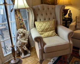 One of two matching custom upholstered wingback chairs.  Absolutely perfect condition.