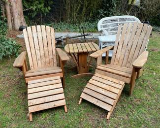Cedar adirondack chairs with footrests and matching table