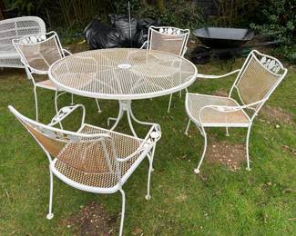 Iron table + 4 chairs + umbrella