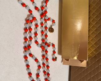 Orange and White Necklace $6.00