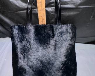 Fuzy Black Purse $5.00