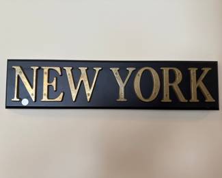 4 signs with brass letters