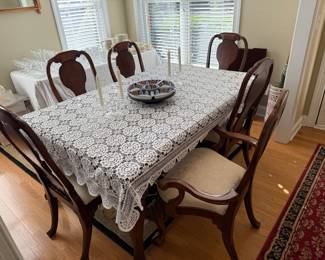 Presale item priced at 750. Mint table with 6 chairs, extra leaf, and table pads. Item purchased at Hendrick Furniture.