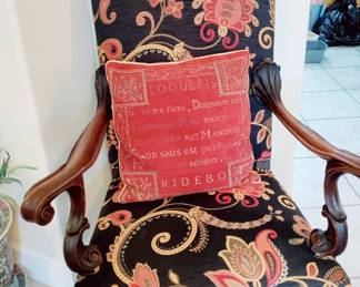 ANTIQUE  CHAIR UPHOLSTERED  IN PAISLEY, SOLID WOOD, CARVED BASE & ARMS, CASTERS FRONT LEGS