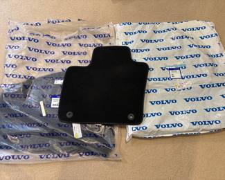 Volvo car mats, 4, black. Brand new, never used!