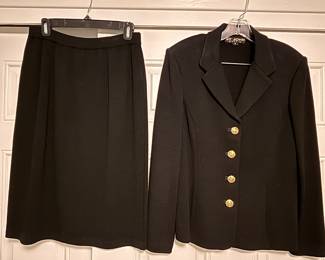 Size 10 black St. John Knit skirt suit. Excellent condition.