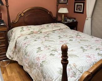 Queen cherry bed and bedspread. Mattress also for sale.