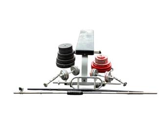 ANMC620 Weight Lifting Assortment This set includes three bars, two pairs of dumbbell bars, a bench with wheels and assorted weights including anti roll weight plates
