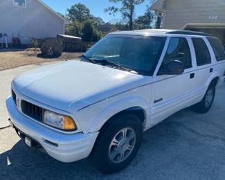 1997 Chevy Bravada - 84,000 miles - $ 4,800.00 - WILL NOT reduce Saturday - offers at check out during sale hours.