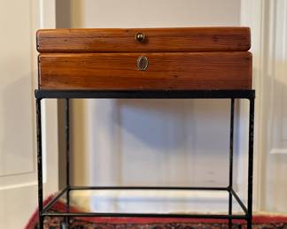 Wooden box in stand