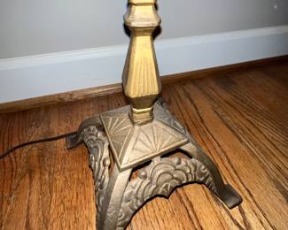 Detail of vintage brass floor lamp base