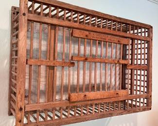 Chicken cage turned wall decor