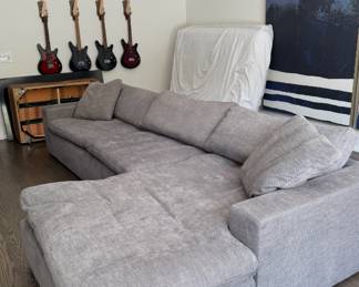 New sectional has only been in the room for less than one month in excellent condition. Down feather memory foam Phil high-performance fabric asking $1500. This was custom ordered through a high-end website.