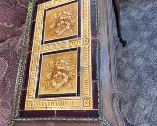 Detail of Tile on antique table