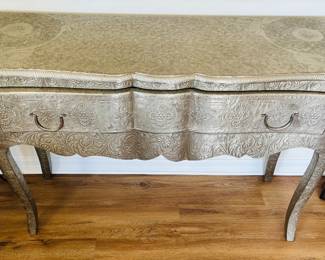 Very creative design, a wavy table.