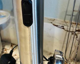 Electric wine opener.  Handy is you open "a lot" of wine bottles.