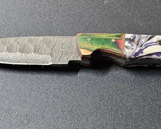 Damascus Steel Knive is about 8in Long