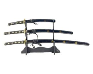 Three-piece sword set with hanging rack