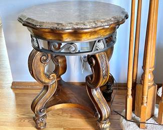 Ornate round occasional table with Stone top