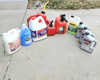 Assorted Garage Items: Gas Cans, Cleaners, Diesel Kleen, Windshield Cleaner & Roof Gard