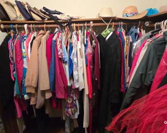 closet full of clothes vintage men's and women's and modern 