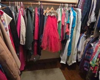 closet full of clothes vintage men's and women's and modern 