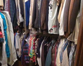 closet full of clothes vintage men's and women's and modern 