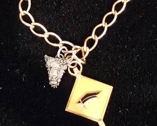 gold filled lady's bracelet with charms 