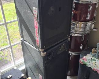 Peavy amp and speakers and drums 