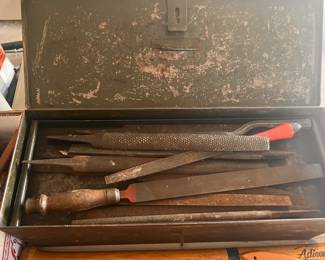 toolbox with assorted files