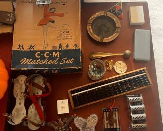 abacus, roller blades, ice skates, ashtrays, medals