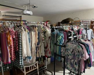 Clothes, mostly women’s 10-12, blankets, tablecloths, aprons, etc