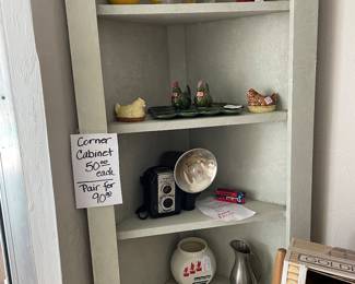Corner cabinet with camera with case, film, flash