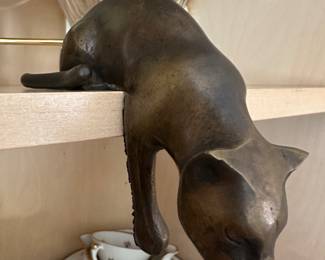 Brass cat shelf sitter
