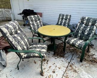 Outdoor set in green, wrought iron; umbrella stand, umbrella and cushions 
