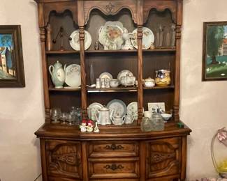 Vintage China cabinet with curved design, china pieces, crystal...