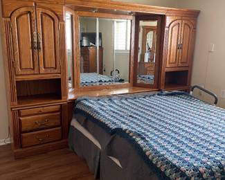 Oak queen bed headboard with storage and night stands
Mattress, box springs and bed frame not included