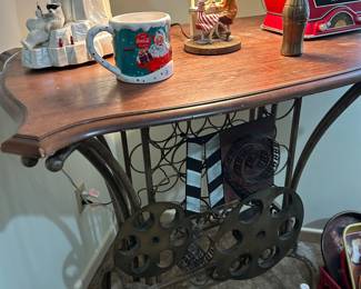Wine rack, table, and Coca-Cola collectibles
