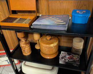 Knives, wood carved pieces, frying pan