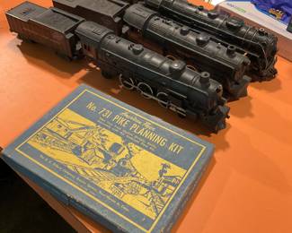 Loads of model railroad toys with some custom made bridges and buildings. More pics to come.